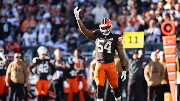 Nov 19, 2023; Cleveland, Ohio, USA; Cleveland Browns defensive end Ogbo Okoronkwo (54) raises his arm to pump up the crowd against the Pittsburgh Steelers during the third quarter at Cleveland Browns Stadium. 